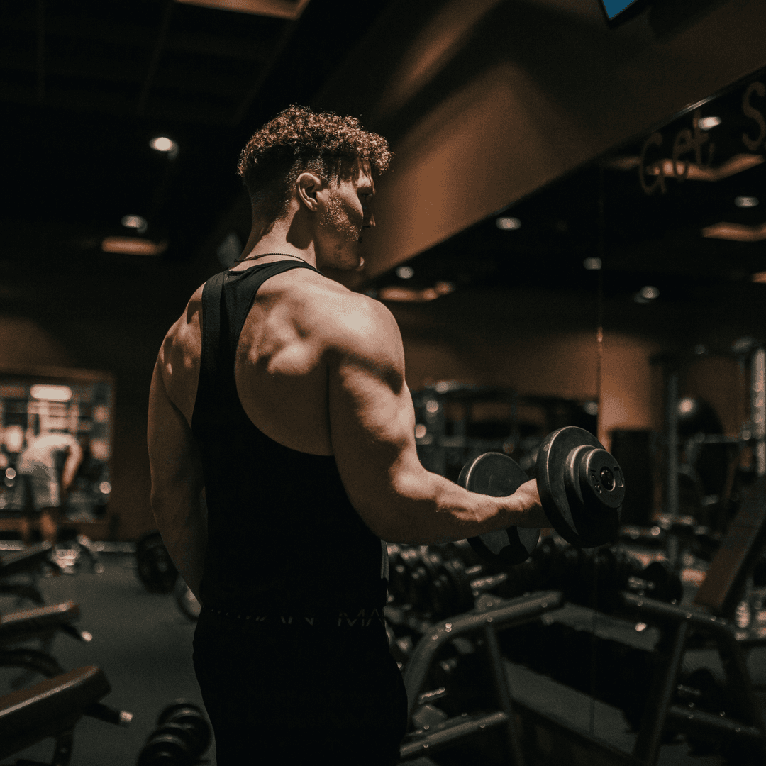 man lifting weights